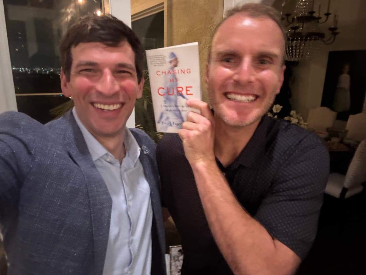 Jay with an author at a book event